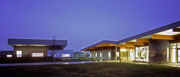 Multipurpose building, gym and cafeteria on the left; the administration building on the right (photo by Gregory Blore)