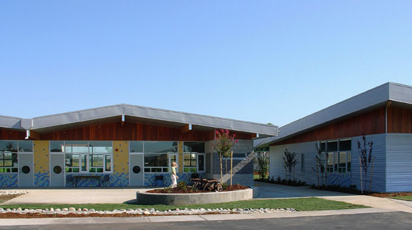 Classrooms on left; special education building on right (photo by Gregory Blore)